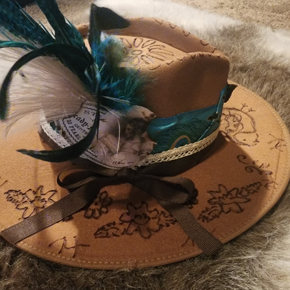 Western hand burned fadora tan in color